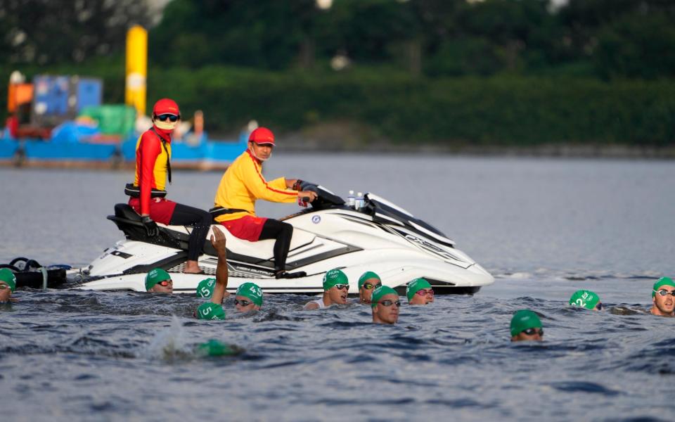 Athletes return to the dock after a false start - AP