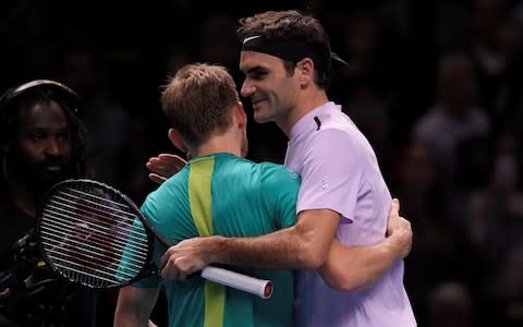 L-R David Goffin and Roger Federer - Credit: Reuters