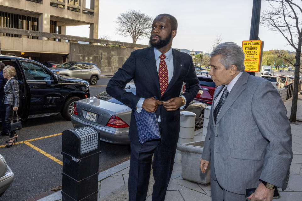 Pras Michel, a member of the 1990’s hip-hop group the Fugees and his lawyer David Kenner (R) arrive at U.S. District Court on April 3, 2023 in Washington, DC. Michel is on trial for his alleged participation in a campaign finance conspiracy.