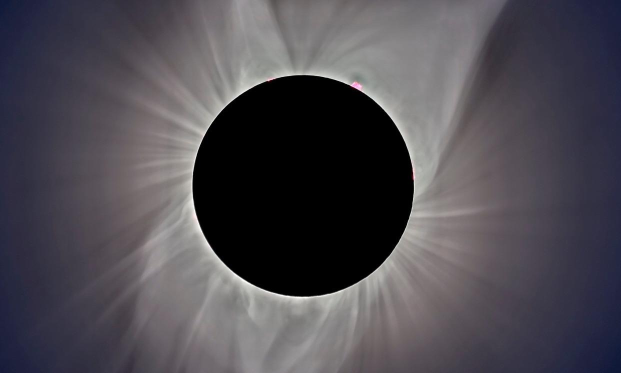 Delicate streamers in the sun's corona surround the totally eclipsed sun during the Aug. 21, 2017, total solar eclipse. Observers along a narrow track from Mexico to Maine should have a similar view on April 8, 2024.