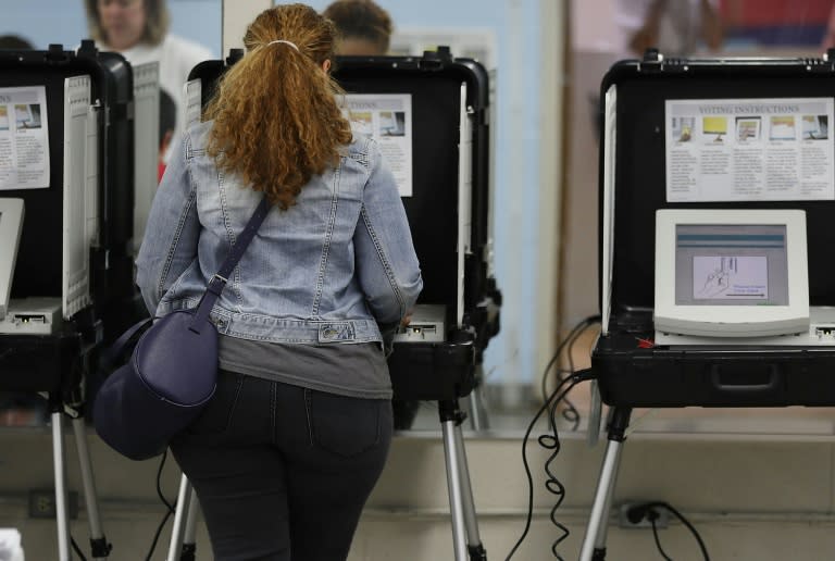 Voters cast their ballots for Georgia's 6th Congressional District in a special election