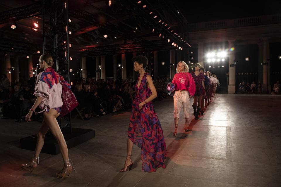 Models wear creations for the Isabel Marant Spring-Summer 2022 ready-to-wear fashion show in Paris, Thursday, Sept. 30, 2021. (Photo by Vianney Le Caer/Invision/AP)