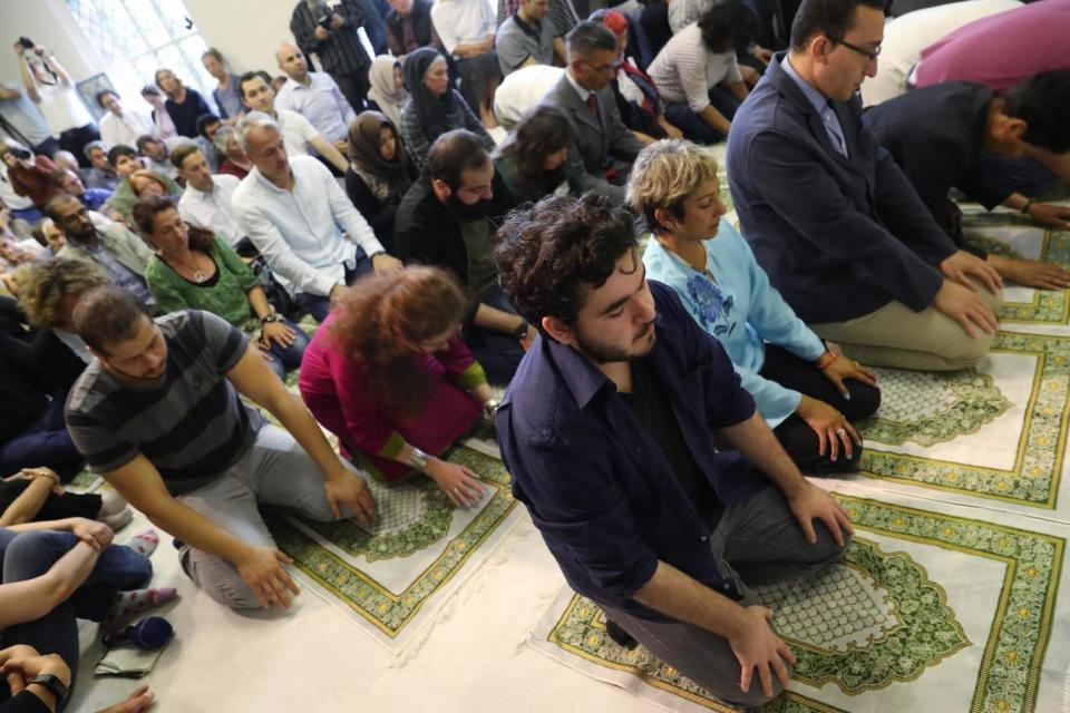 Muslims attend Friday prayers during the opening of the Berlin mosque (Getty Images)