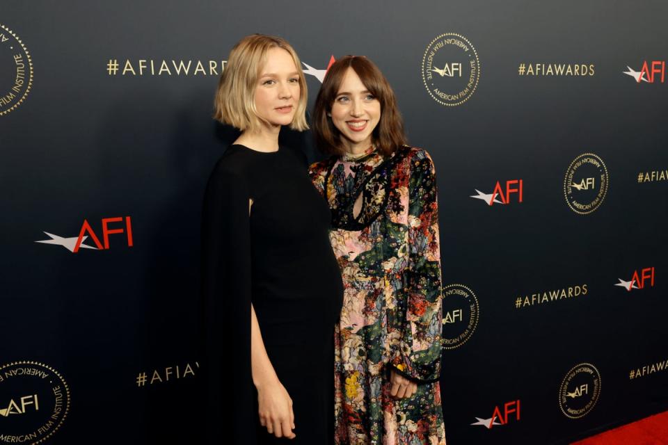 Carrey Mulligan (left) originally set tongues wagging when she appeared to be glowing at an event on Friday (Getty Images)