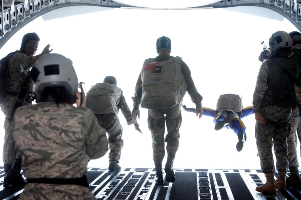 Thai parachutists attend a training session as part of the "Cope Tiger 2010" joint Air Force exercise over Lop Buri province, about 153 km (96 miles) North of Bangkok March 3, 2010.