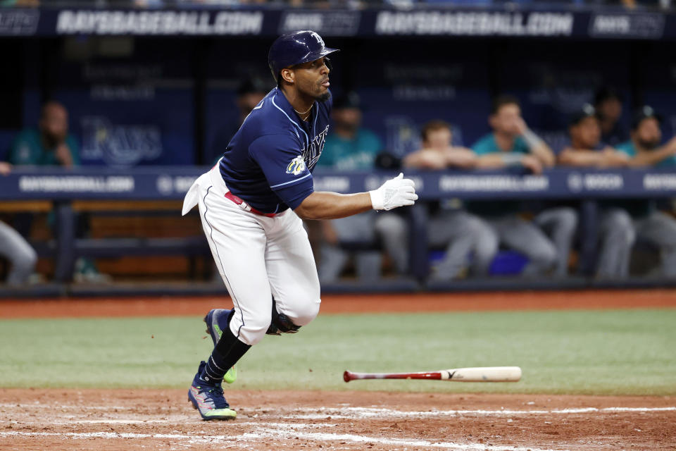 Tampa Bay Rays' Yandy Diaz watches the ball after hitting a walk off two-run home run against the Seattle Mariners during a baseball game Saturday, Sept. 9, 2023, in St. Petersburg, Fla. (AP Photo/Scott Audette)