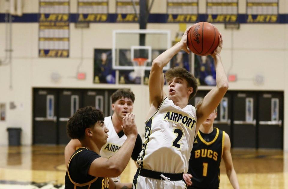 Colin Nowak puts up a shot for Airport during a 66-57 victory over Riverview Friday night.