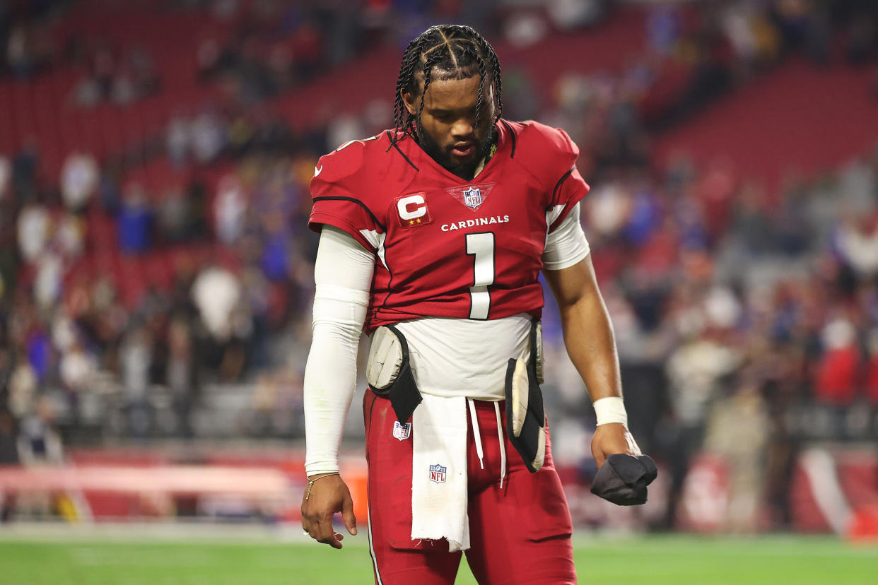 GLENDALE, ARIZONA - DECEMBER 13: Kyler Murray #1 of the Arizona Cardinals walks off the field after a loss against the Los Angeles Rams at State Farm Stadium on December 13, 2021 in Glendale, Arizona. (Photo by Christian Petersen/Getty Images)