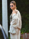 <p>Hailey Baldwin keeps things chic and cozy on Sunday in Los Angeles after returning from a road trip with husband Justin Bieber. </p>