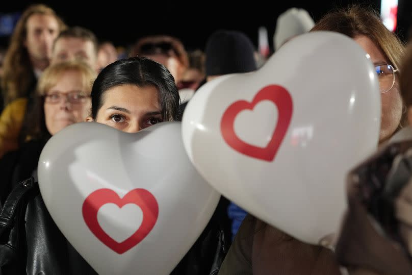 Supporters of Poland&apos;s opposition leader Donald Tusk rally outside state television TVP building in Warsaw, October 2023