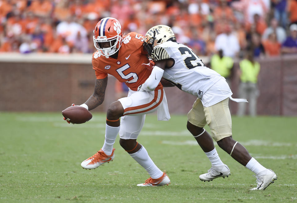 Clemson wide receiver Tee Higgins runs for yardage after making a catch against Wake Forest. (AP Photo)