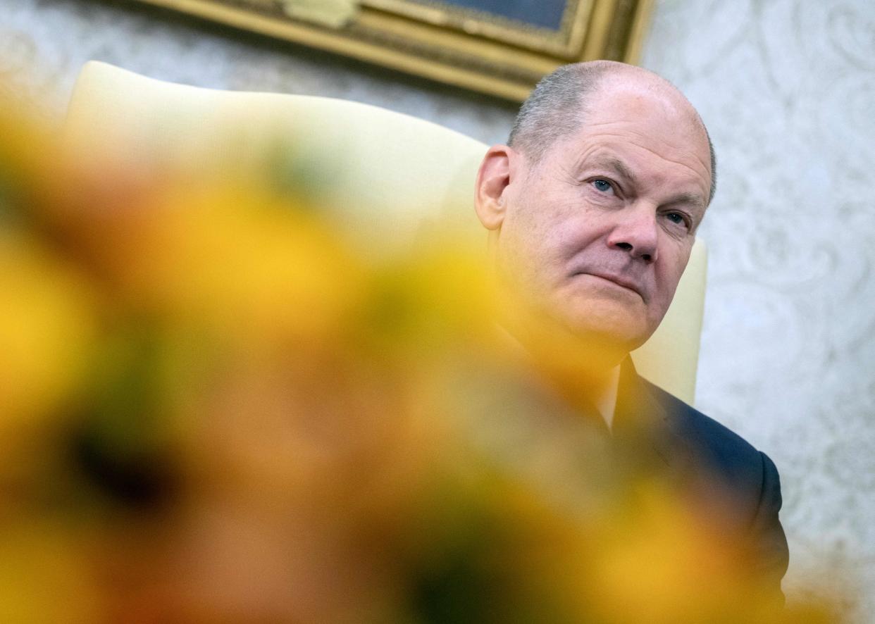 German chancellor Olaf Scholz listens as he meets with US president Joe Biden in the Oval Office of the White House in Washington, DC, on 3 March 2023 (AFP via Getty Images)