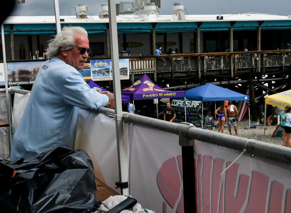 Phil Salick watches the action during the NKF Rich Salick Pro-Am Surf Festival in Cocoa Beach Saturday, Oct. 10, 2020. Craig Bailey/FLORIDA TODAY via USA TODAY NETWORK