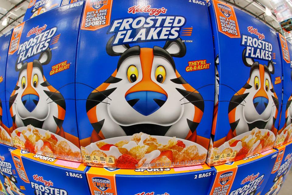This is a display of Kellogg's Frosted Flakes cereal at a Costco Warehouse in Homestead, Pennsylvania, on Thursday, May 14, 2020. Kellogg's announced Tuesday, June 21, 2022, that it is splitting into three companies: a cereal maker, a snack maker and a plant-based food company. Kellogg's, whose brands include Eggo waffles, Rice Krispies cereal and MorningStar Farms vegetarian products, said the proposed spinoffs of the yet to be named cereal and plant-based companies are expected to be completed by the end of 2023.