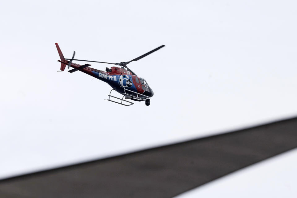 The 6ABC helicopter known as Chopper 6 flies over Philadelphia's Penn Landing on Thursday, Sept. 7, 2023. The Helicopter crashed on Dec 19, 2023, killing both the pilot and photographer on board. (Elizabeth Robertson/The Philadelphia Inquirer via AP)