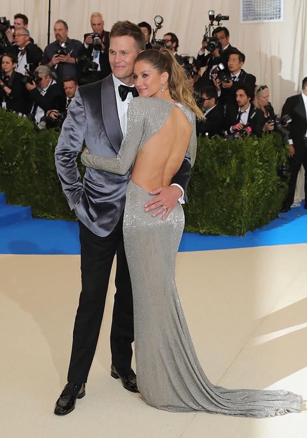 Tom looked proud as punch as he stood by his supermodel wife. Photo: Getty