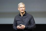 Apple Inc CEO Tim Cook speaks during Apple Inc's media event in Cupertino, California September 10, 2013. (REUTERS/Stephen Lam)