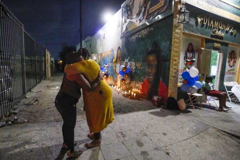 Los Angeles, CA, Tuesday, August 9, 2022 - Friends and family gather at the Diamond Z Salon in memory of employee Nathesia Lewis who was one of five people killed in a car wreck earlier this week. (Robert Gauthier/Los Angeles Times)