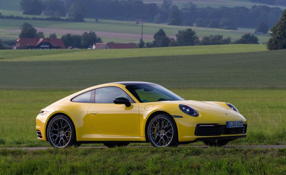 <p>Porsche says the 992-gen Carrera, at about 3400 pounds, weighs around 100 pounds more than the previous 991.2 version.</p>