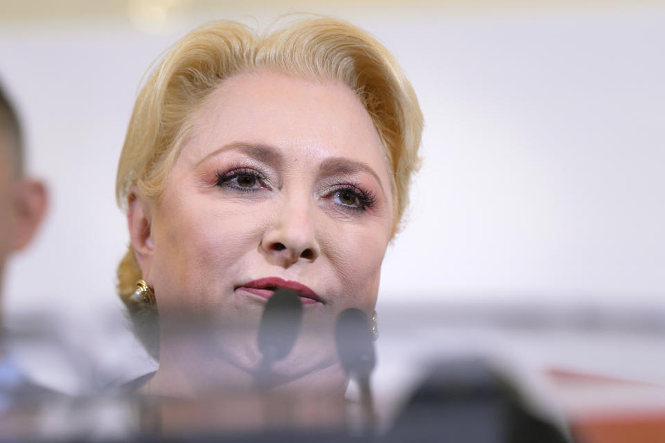 Social Democratic Party leader Viorica Dancila delivers a speech after exit polls were published, in Bucharest, Romania, Sunday, Nov. 24, 2019. An exit poll by the IRES independent think tank predicted incumbent President Klaus Iohannis getting 66.5 % of the votes, with 33.5% for Social Democratic Party leader Viorica Dancila, a former prime minister. (AP Photo/Andreea Alexandru)