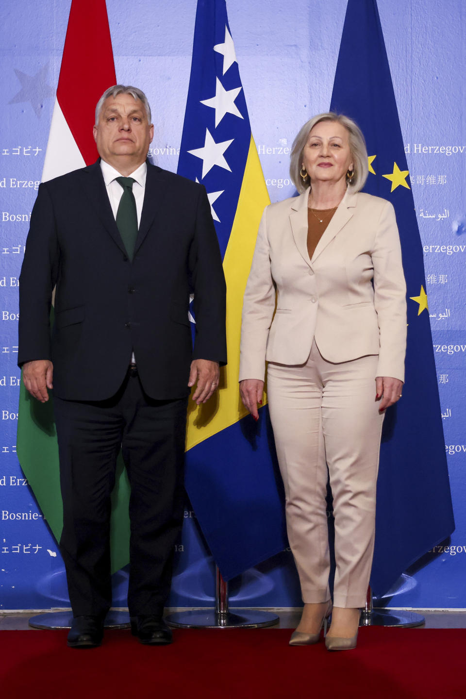 Hungarian Prime Minister Viktor Orban, left, poses for a photo with the President of the Council of Ministers of Bosnia and Herzegovina Borjana Kristo prior to their meeting in Sarajevo, Bosnia, Thursday, April 4, 2024. (AP Photo)