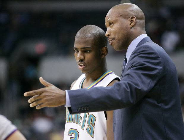 Investors in Legends Tower include Byron Scott, shown in this 2005 photo coaching Chris Paul when the Hornets were temporarily located in Oklahoma City.
