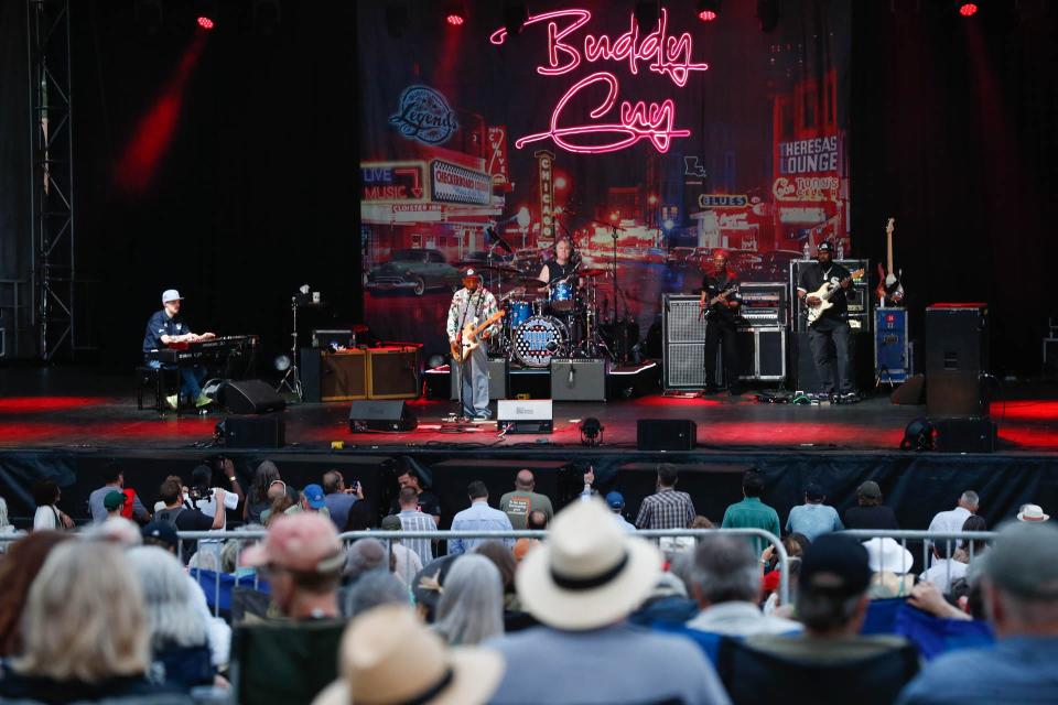 A large crowd enjoys Blues legend Buddy Guy as he performs during the Savannah Music Festival on Sunday March 26, 2023 at Trustees' Garden.