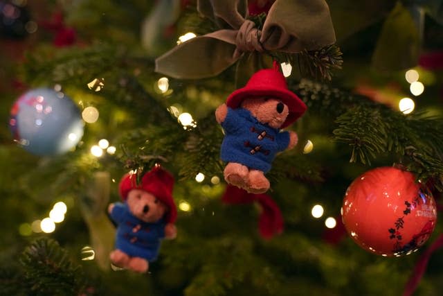 Paddington Bear ornaments on a Christmas tree ahead of the Together at Christmas Carol Service at Westminster Abbey in London