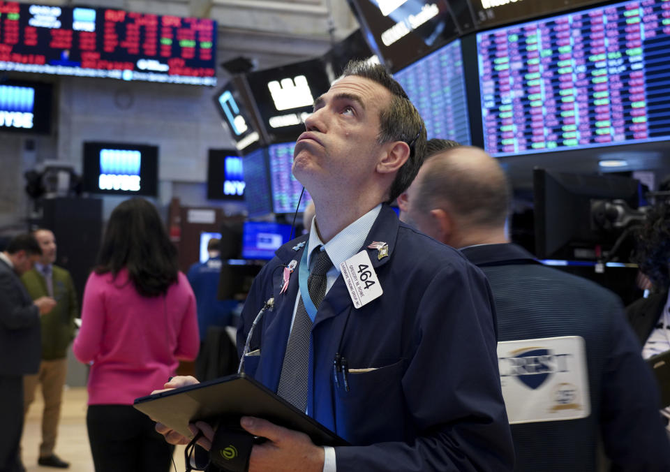 NEW YORK, Feb. 25, 2020 -- Traders work at New York Stock Exchange in New York, the United States, Feb. 25, 2020. U.S. stocks closed sharply lower on Tuesday, continuing a broad market sell-off amid rising risk-averse sentiment. The Dow Jones Industrial Average lost 879.44 points, or 3.15 percent, to 27,081.36. The S&P 500 was down 97.68 points, or 3.03 percent, to 3,128.21. The Nasdaq Composite Index decreased 255.67 points, or 2.77 percent, to 8,965.61. (Photo by Zhang Mocheng/Xinhua via Getty) (Xinhua/Zhang Mocheng via Getty Images)