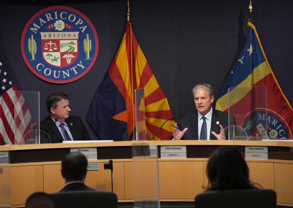 Maricopa County Board of Supervisors Chairman Bill Gates (left) listens to Vice Chairman Clint Hickman question election officials during a hearing before the Board of Supervisors. Maricopa County Elections Department officials were responding to claims about the 2020 general election made by Senate Republican contractors Cyber Ninjas, Cyfir and EchoMail.
