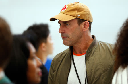 Actor John Hamm takes part in the demonstration of the newly released Apple products following the product launch event at the Steve Jobs Theater in Cupertino, California, U.S. September 12, 2018. REUTERS/Stephen Lam