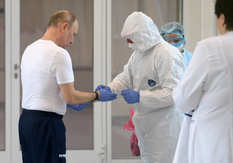 Russian President Putin visits a hospital for patients infected with coronavirus disease (COVID-19) on the outskirts of Moscow