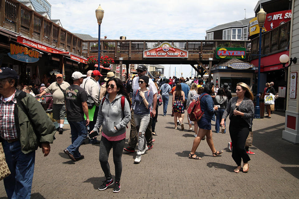 crowd of people outside the wharf