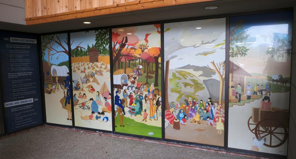 Artwork outside the Cherokee Nation headquarters depict important times in the tribal nation's history, including its forced removal from the southeastern U.S. to Oklahoma.