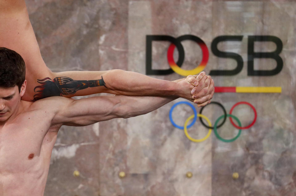 <p>Gymnasts perform during a ceremony marking the 10th anniversary of the German Olympic Sports Confederation (DOSB) in Frankfurt, Germany, May 20, 2016. (Kai Pfaffenbach/REUTERS) </p>