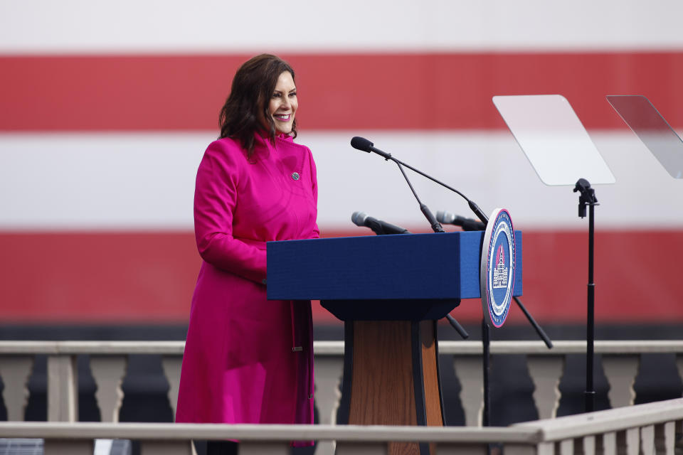 Michigan Gov. Gretchen Whitmer addresses the crowd during her inauguration, Sunday, Jan. 1, 2023, outside the state Capitol in Lansing, Mich. (AP Photo/Al Goldis)