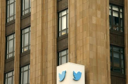 The Twitter logo is shown at its corporate headquarters in San Francisco, California April 28, 2015. REUTERS/Robert Galbraith