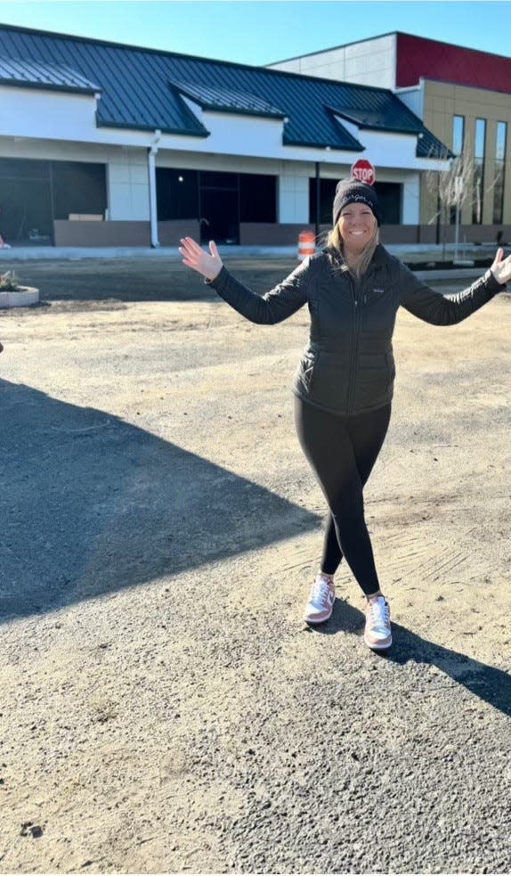 Denise Vetter, owner of Burger 25, outside the third location of her family's business. The restaurant will open in early spring on Route 88, adjacent to the new location of Icarus Brewing.