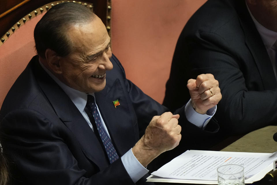 FILE - Silvio Berlusconi smiles ahead of a confidence vote at he Senate for the new Government, in Rome, Oct. 26, 2022. Berlusconi, the boastful billionaire media mogul who was Italy's longest-serving premier despite scandals over his sex-fueled parties and allegations of corruption, died, according to Italian media. He was 86. (AP Photo/Andrew Medichini, File)