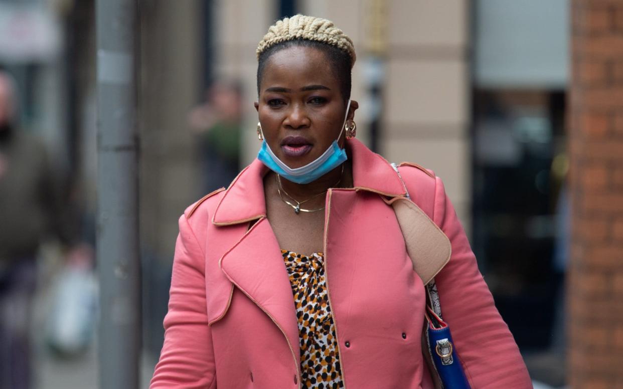 Comfort Konadu, pictured leaving Manchester Crown Court, where she was given a suspended sentence for theft - Cavendish Press/Ricky Champagne/Cavendish Press/Ricky Champagne