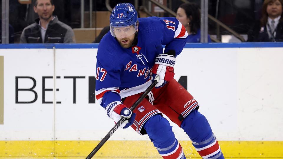 New York Rangers right wing Blake Wheeler (17) skates with the puck against the Calgary Flames during the first period at Madison Square Garden.