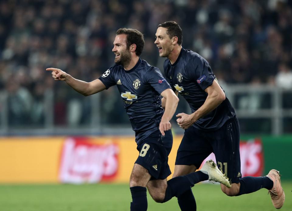 Juan Mata celebrates after scoring for Manchester United