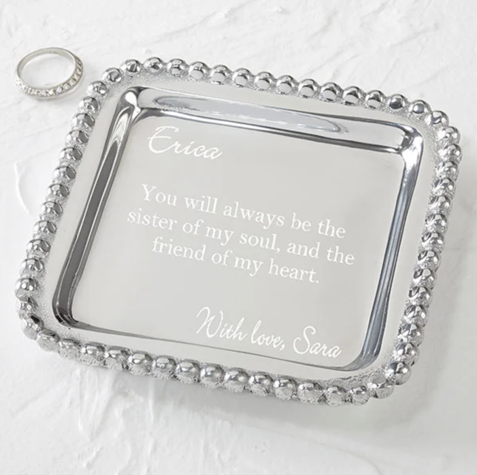 <p><a href="https://go.redirectingat.com?id=74968X1596630&url=https%3A%2F%2Fwww.personalizationmall.com%2FMariposa-Personalized-Silver-Jewelry-Tray-p24216.prod%3Fsdest%3Dhome-cert&sref=https%3A%2F%2Fwww.countryliving.com%2Fshopping%2Fgifts%2Fg4767%2Fbirthday-gifts-for-her%2F" rel="nofollow noopener" target="_blank" data-ylk="slk:Shop Now;elm:context_link;itc:0;sec:content-canvas" class="link ">Shop Now</a></p><p>Personalized Square Jewelry Tray</p><p>personalizationmall.com</p><p>$34.99</p><span class="copyright">Mariposa</span>