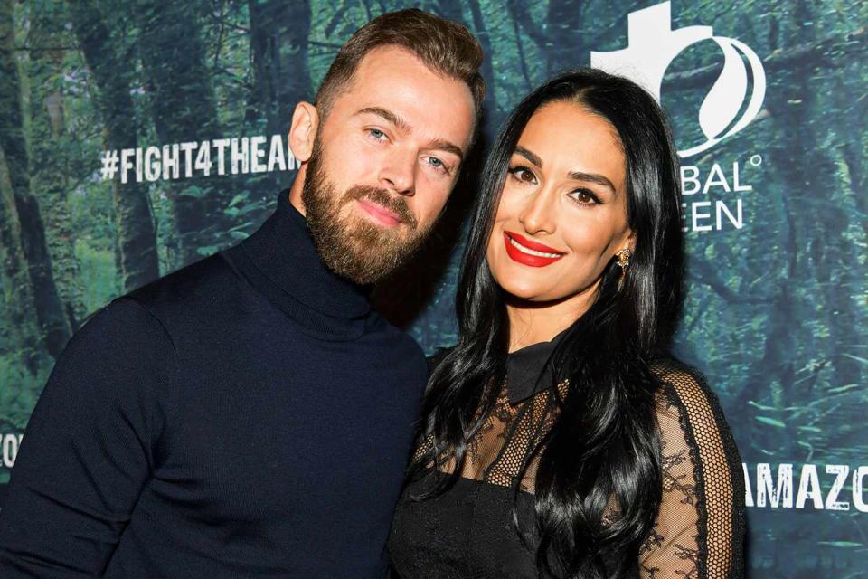 Artem Chigvintsev (L) and Nikki Bella attend the PUBG Mobile's #FIGHT4THEAMAZON Event at Avalon Hollywood on December 09, 2019 in Los Angeles, California.