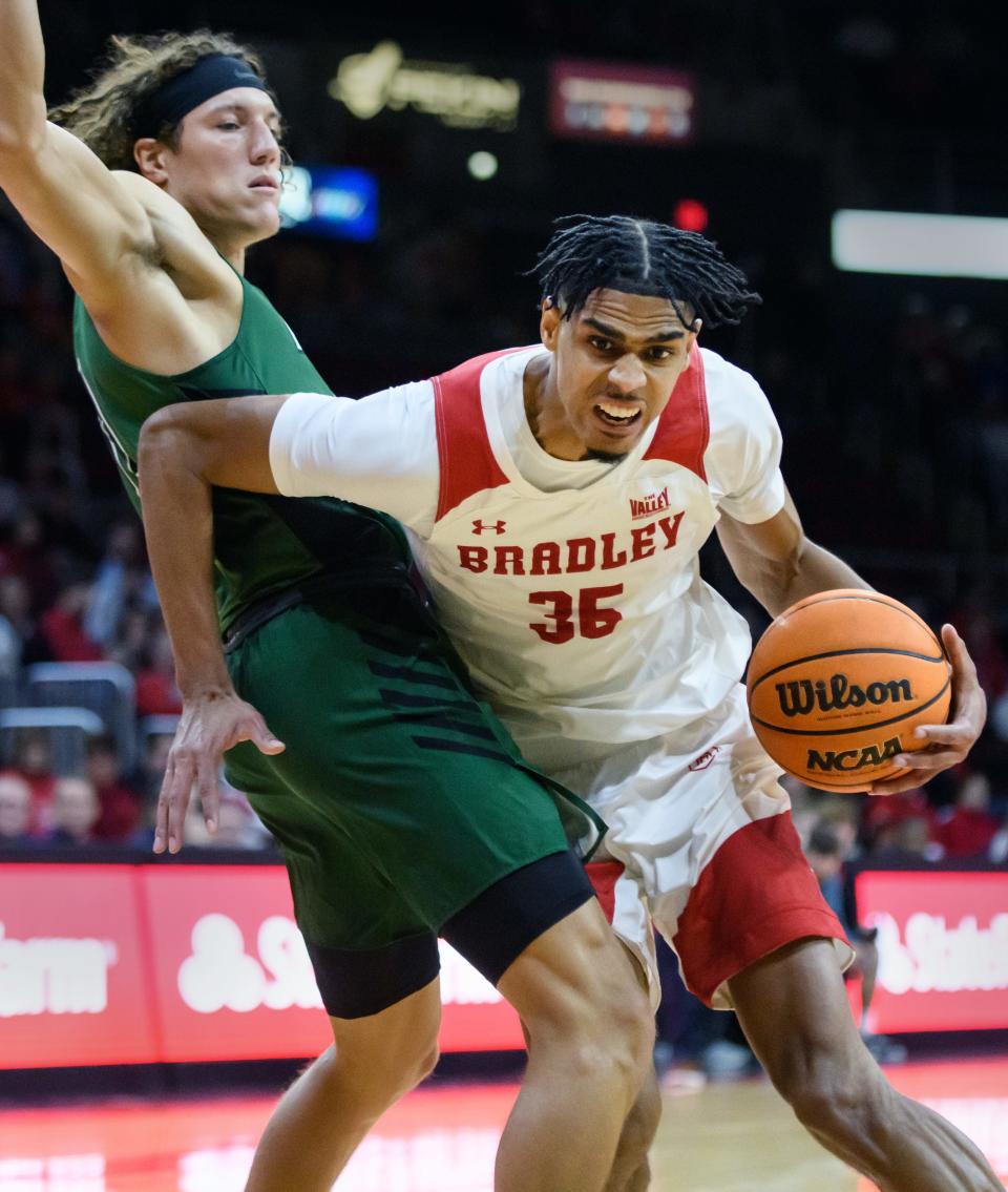 Bradley's Darius Hannah, right, tangles with UW-Parkside's Jacksun Hamilton in the first half of the Braves' season opener Monday, Nov. 7, 2022 at Carver Arena. The Braves defeated the Rangers 93-59.