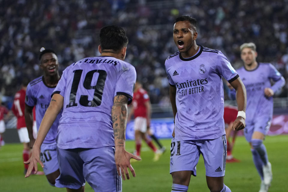 Real Madrid's Rodrygo, right, celebrates with teammates after scoring his side's third goal during the FIFA Club World Cup semi final match between Al Ahly and Real Madrid at Prince Moulay Abdellah stadium in Rabat, Morocco, Wednesday, Feb. 8, 2023. (AP Photo/Manu Fernandez)