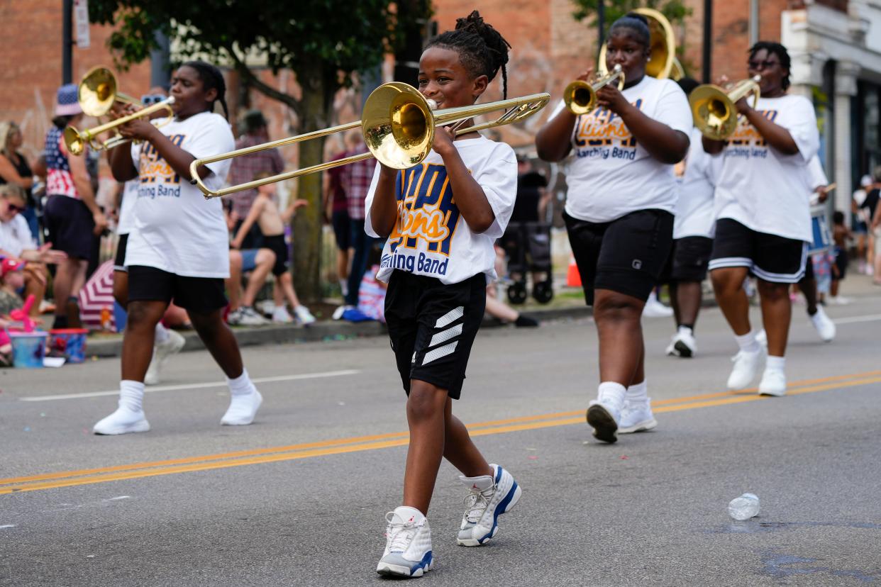 Cincinnati College Preparatory Academy Lions Marching Band performs on Tuesday, July 4, 2023, during the Northside Fourth of July Parade.