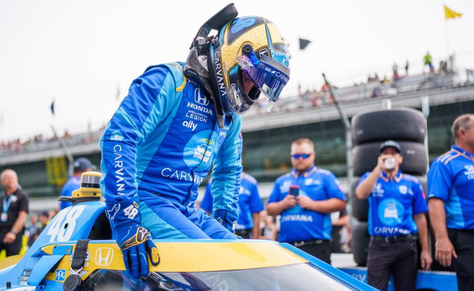 Chip Ganassi Racing driver Jimmie Johnson (48) sits down into his car Saturday, May 21, 2022, during qualifying for the 106th running of the Indianapolis 500 at Indianapolis Motor Speedway.