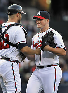 Rookie closer Craig Kimbrel has accepted congratulations from veteran catcher Brian McCann several times already