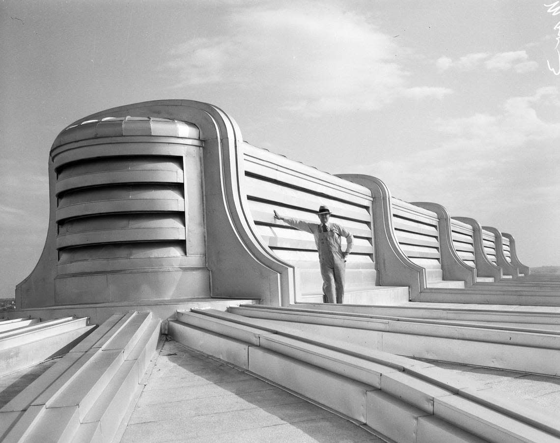 The ventilation system cover above the coliseum looks like modern sculpture, 1937. The man might be structural engineer Herbert Hinckley.